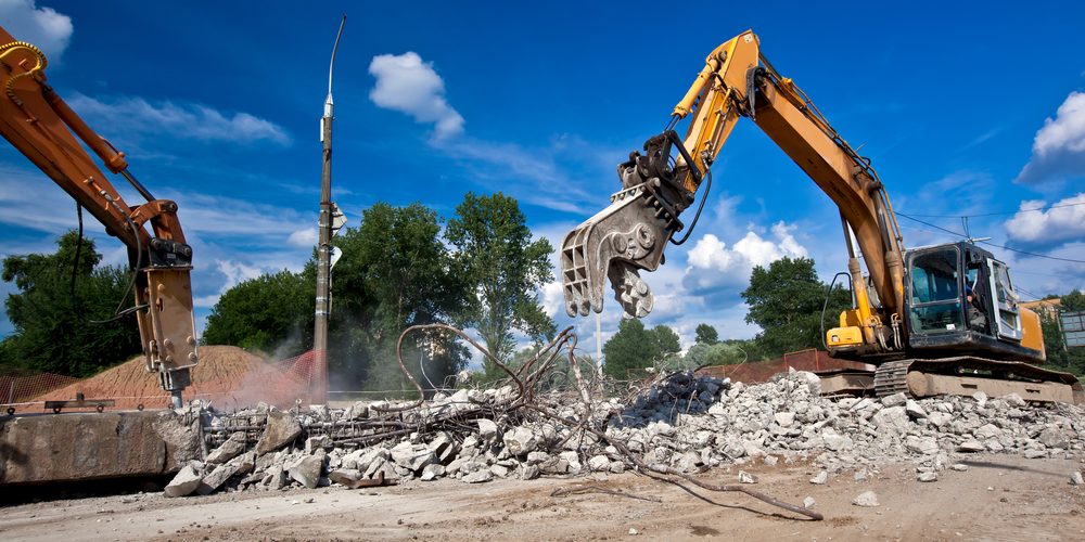 Using Excavators with Wrecking Balls: Effective Demolition Strategies