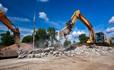 Using Excavators with Wrecking Balls: Effective Demolition Strategies